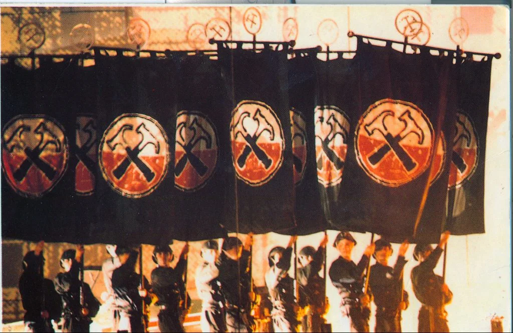 Flag bearers with the Hammers motif from Pink Floyd's The Wall