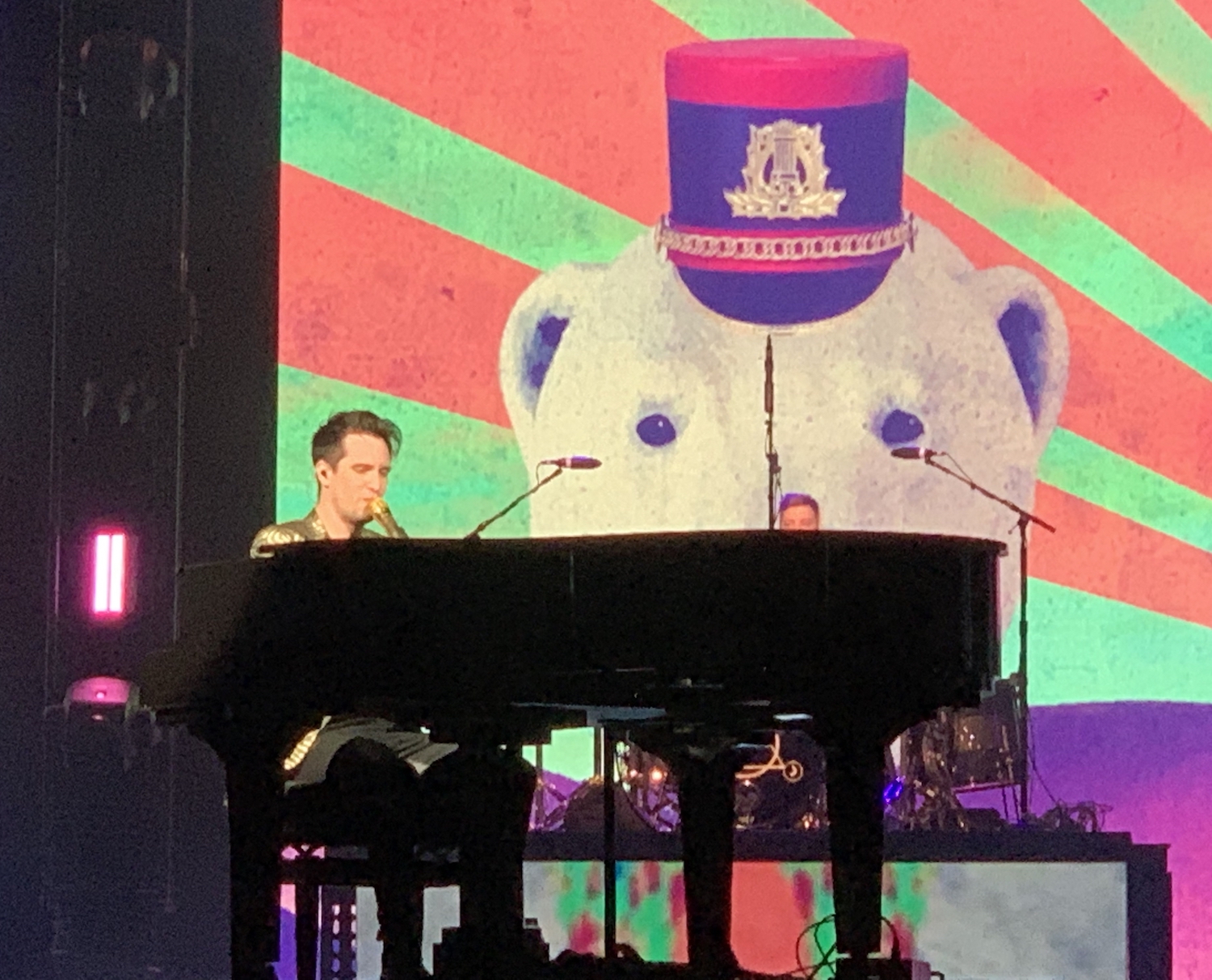 Branded Urie seated at the Piano