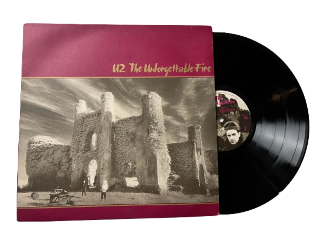 U2 Unforgettable Fire LP with Black Vinyl on white background
