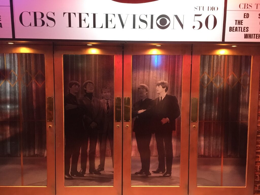 A recreation of the CBS Television Studios entrance with a photo of the Beatles standing with Ed Sullivan