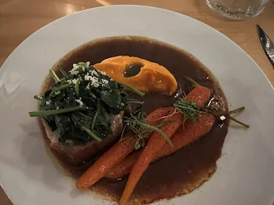 A rich plate of Carrots and Beef at Restaurant Le Coke