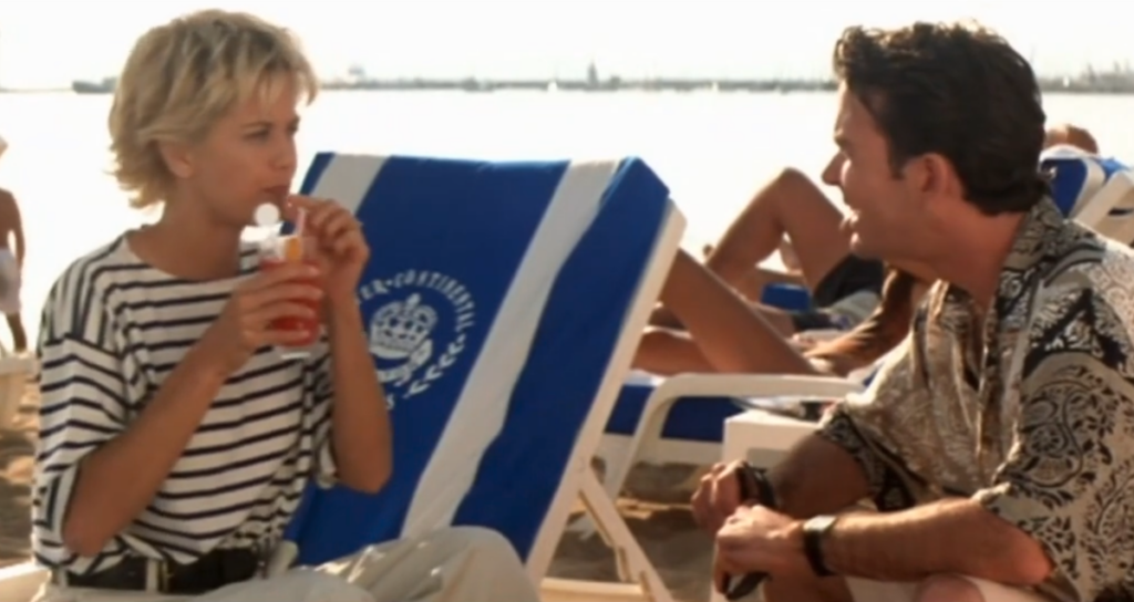 Meg Ryan sips a cocktail on the beach in Cannes