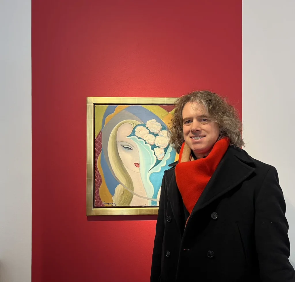 Jay in front of the original artwork used for Layla and Associated Love Songs.