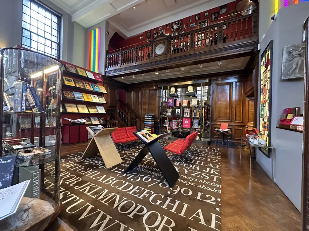 The Interior of Maison Assouline showing the iconic carpet and gallery