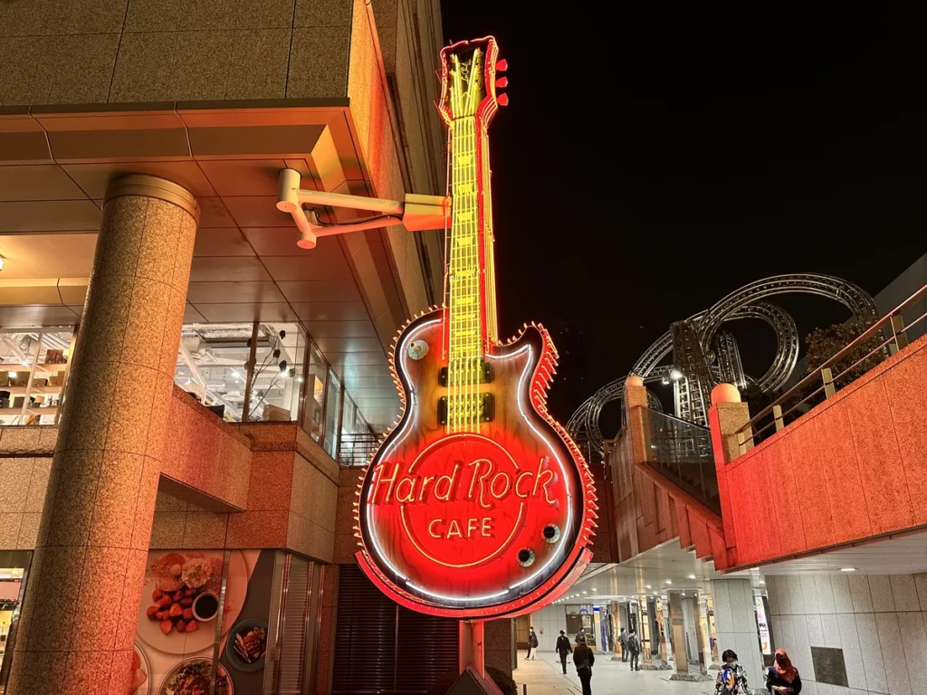 The huge Red Guitar lit up in red outside Yokohama's Hard Rock Cafe