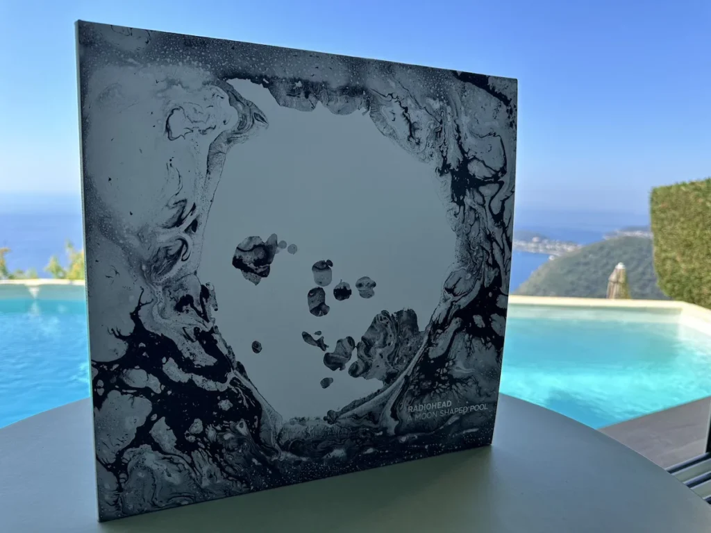 The LP A Moon Shaped Pool photographed by a Pool at the Chevre D'Or in Eze.