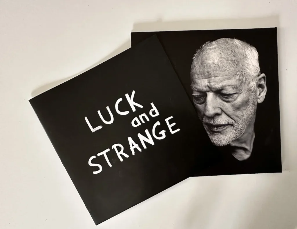 The back cover of Luck and Strange Album cover with a portrait of David Gilmour