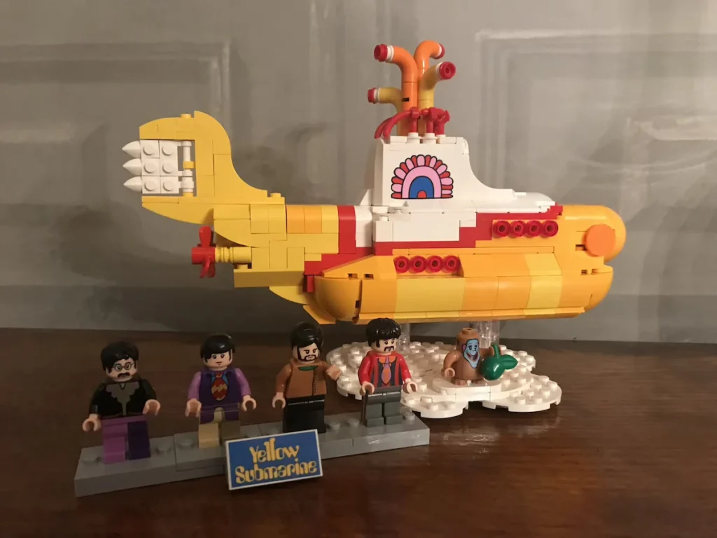 The Beatles Yellow Submarine Lego with the Fab Four standing in front 