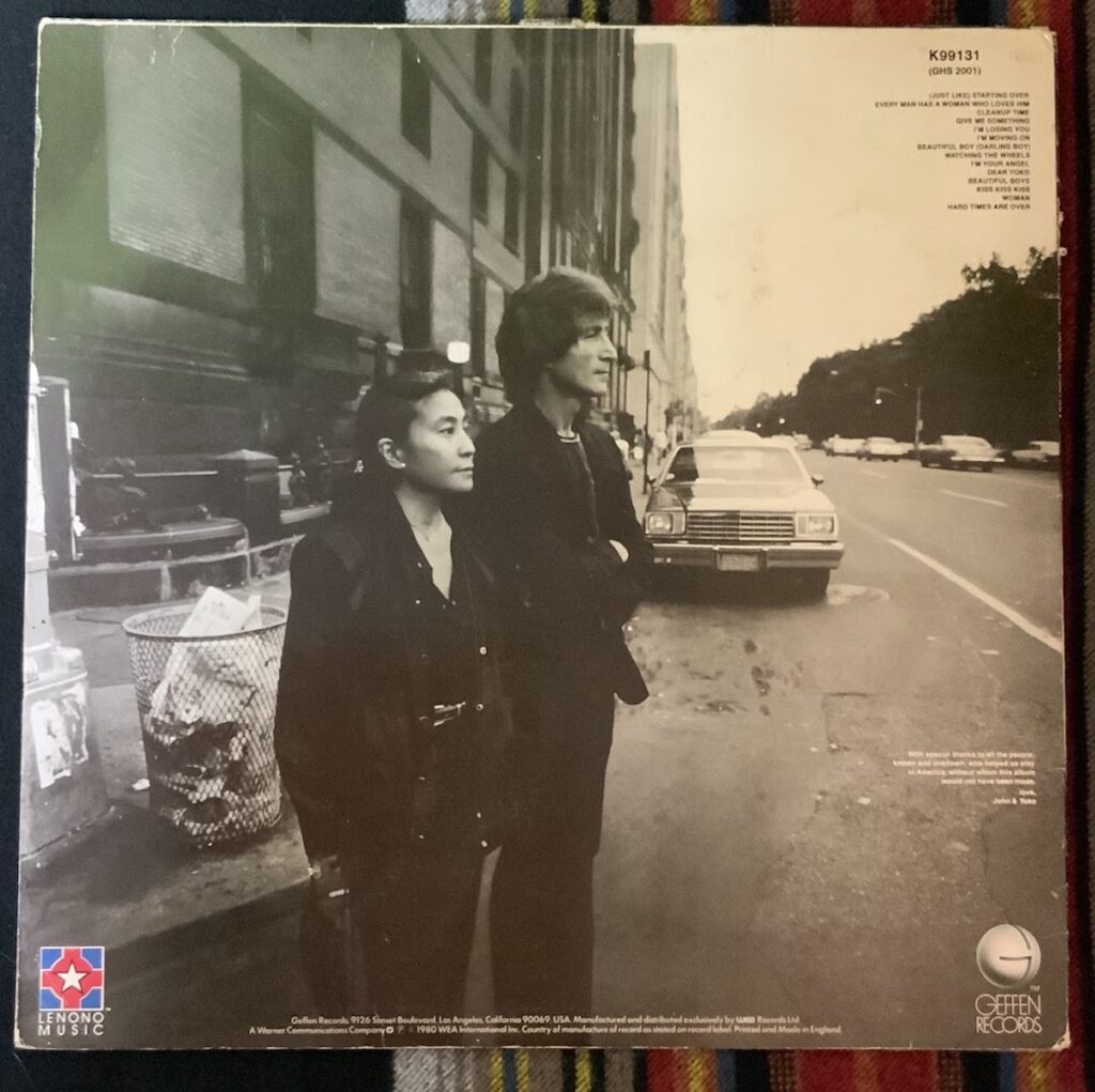 The back cover of Double Fantasy showing a very normal looking John and Yoko on a New York street