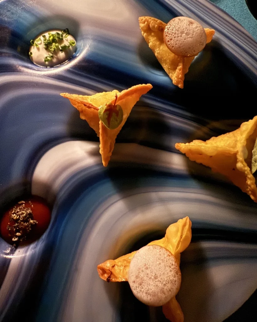 A beautiful plate of WonTon looks like planets in the solar system on this plate from Jing