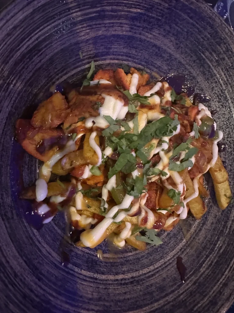 A multicoloured plate of chips, sauce and chicken strips tastes a lot better than it looks at the Blue Naan restaurant in Felixstowe