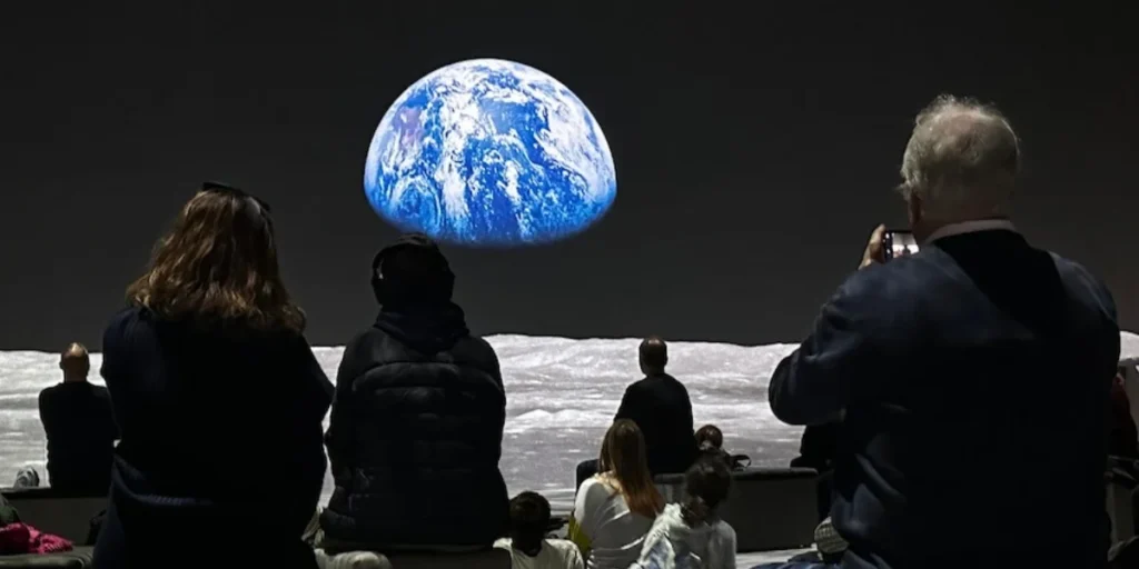 Earth rises above the Moonwalkers Art Installation